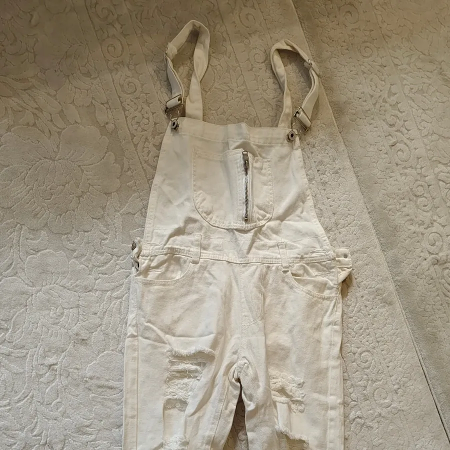 شلوار جین سفید زاپ دار