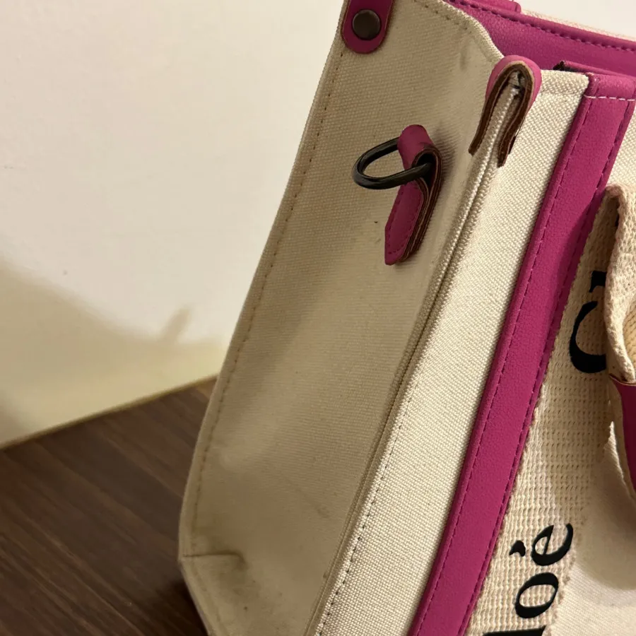 کیف دستی سفید و صورتی