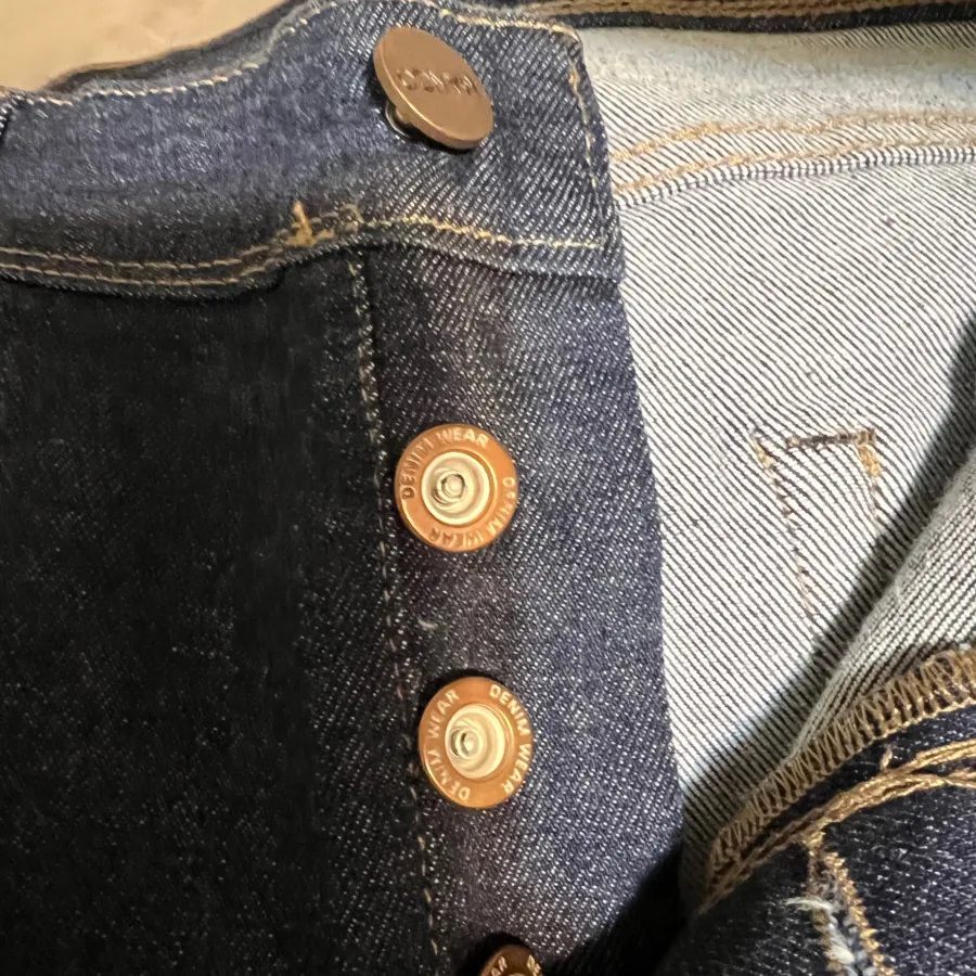 شلوار جین سرمه ای منگو