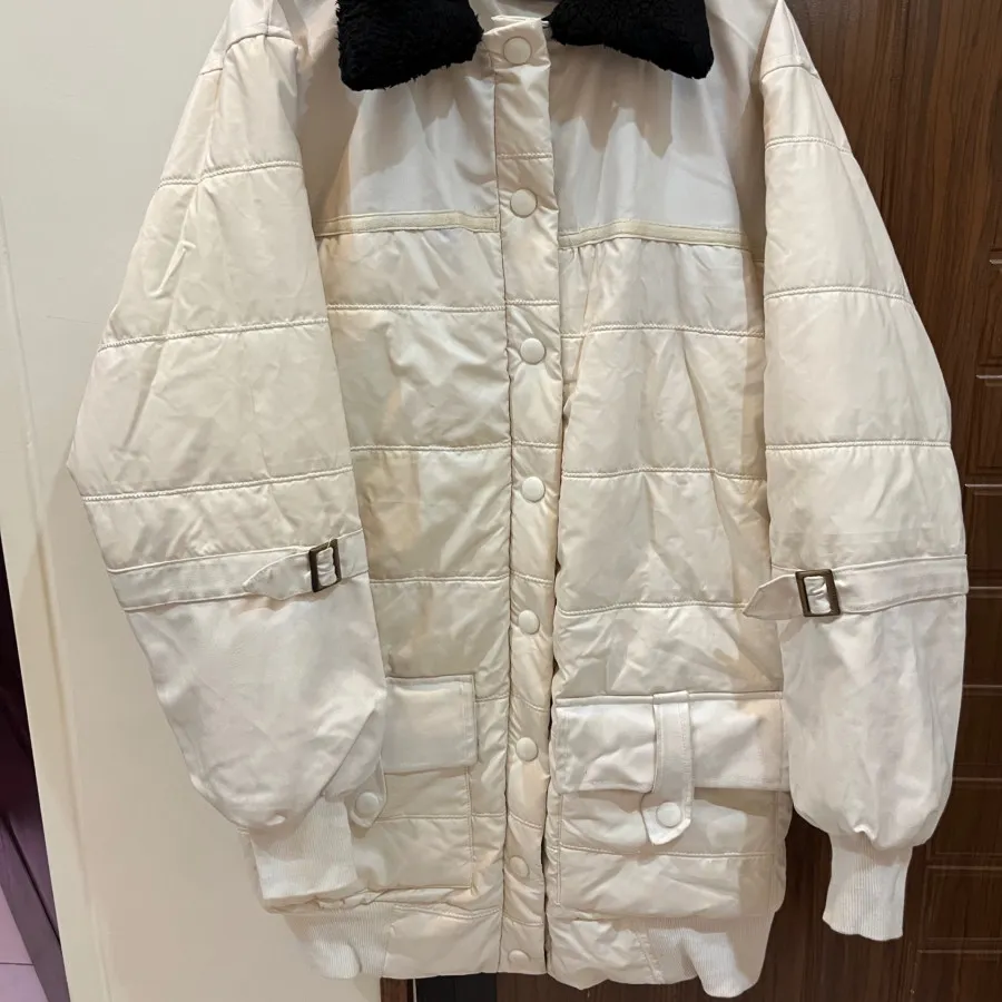 کاپشن چرم سفید