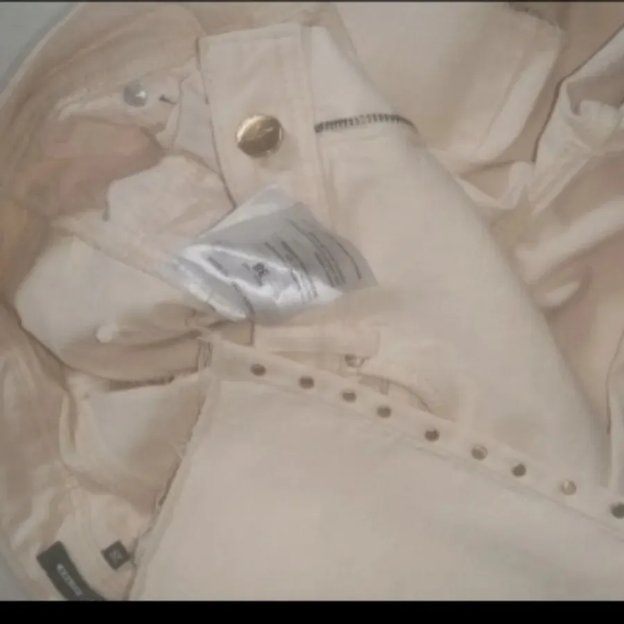 شلوار دمپا فلر شیری خارجی