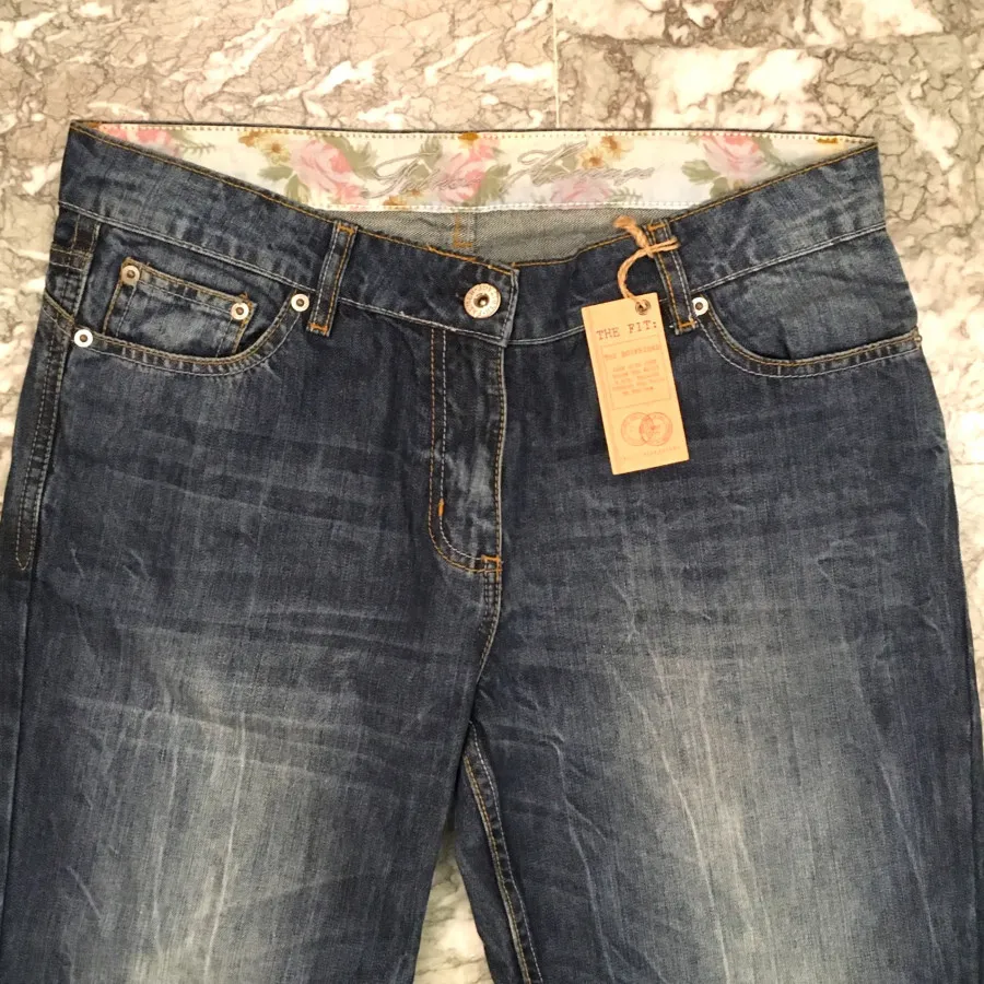 شلوار جین تگدار