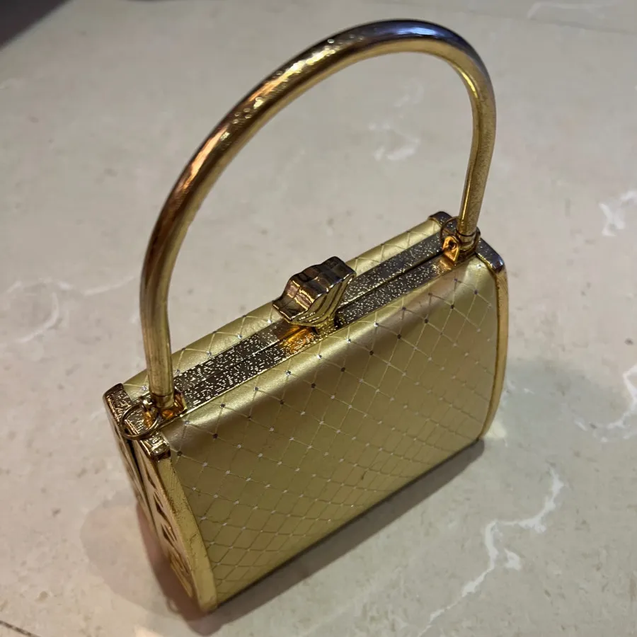 کیف مجلسی طلایی