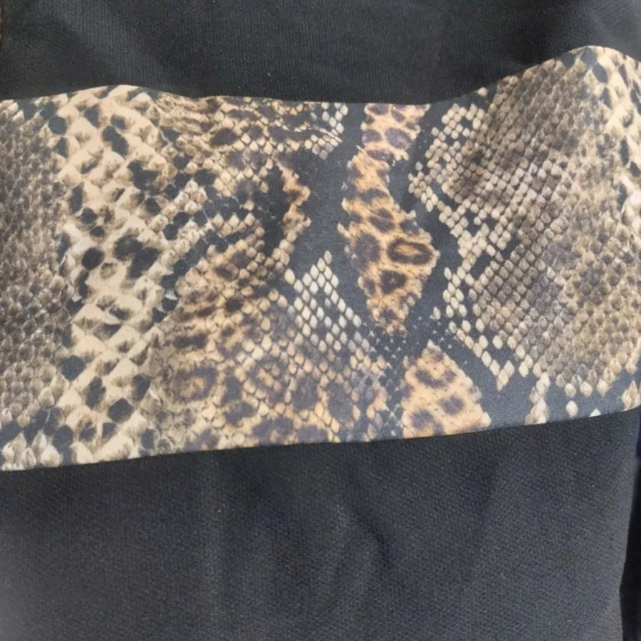 مانتو مشکی و پوست ماری