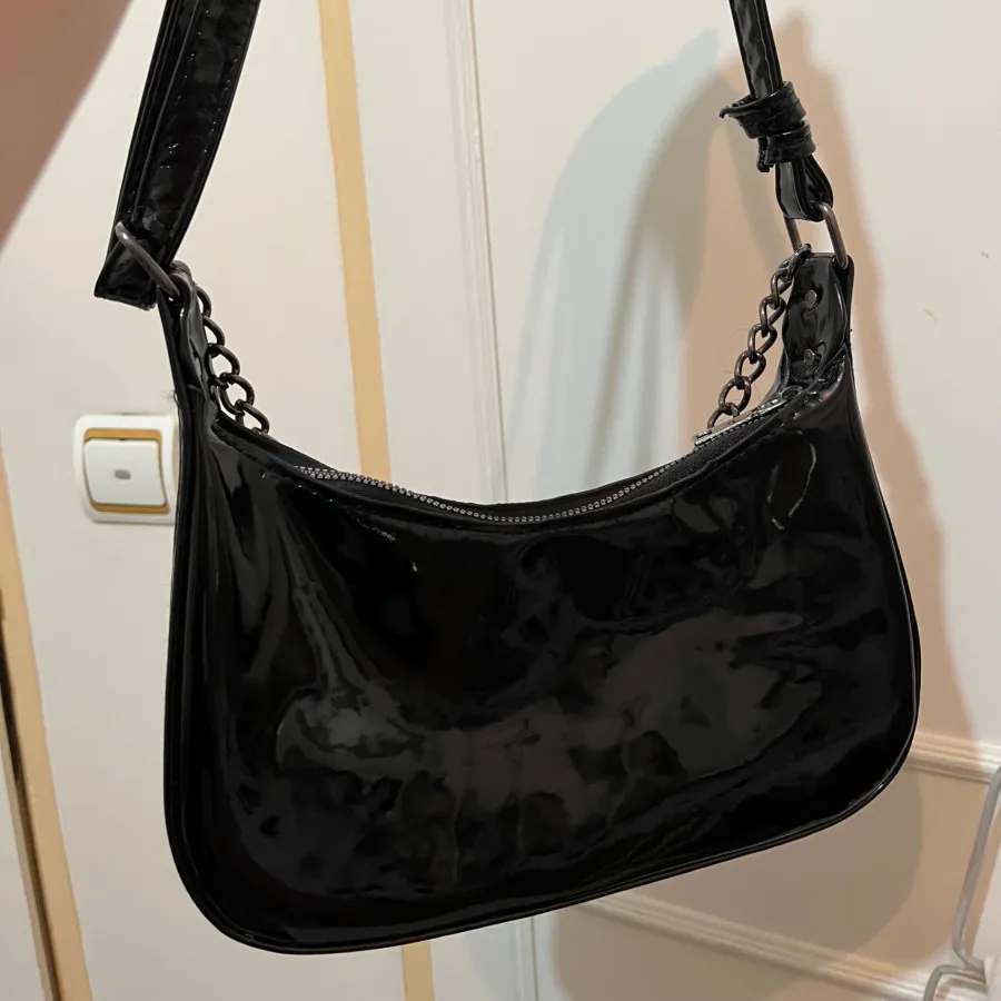 کیف مشکی ورنی مجلسی