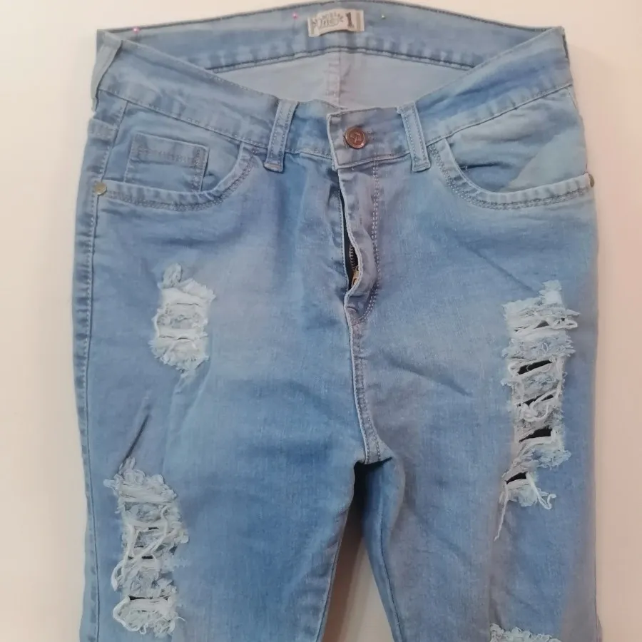 شلوار جین کشی زاپدار