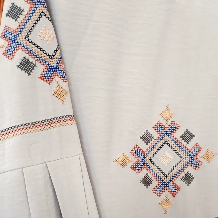 مانتو بلند شماره دوزی