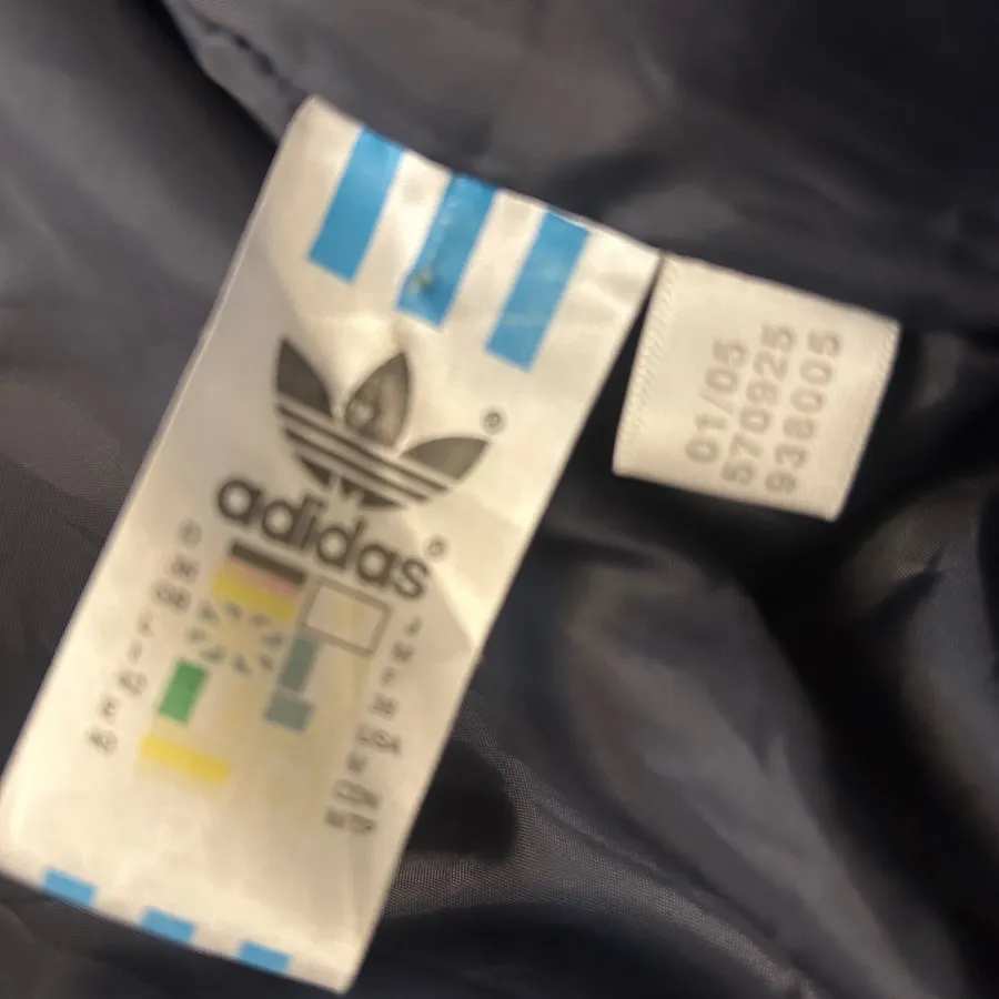 کاپشن ادیداس