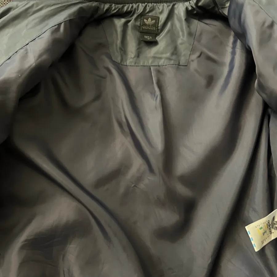 کاپشن ادیداس