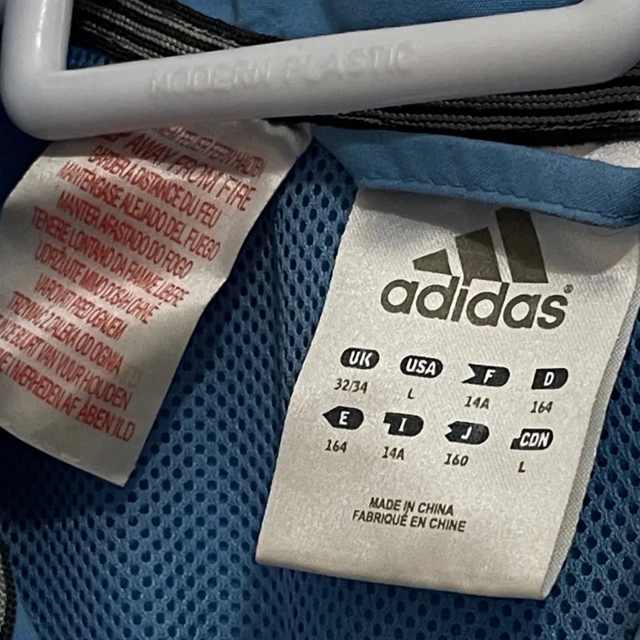 کاپشن ورزشی  آدیداس