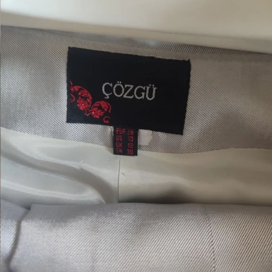 ست کت و دامن طوسی-نقره‌ای