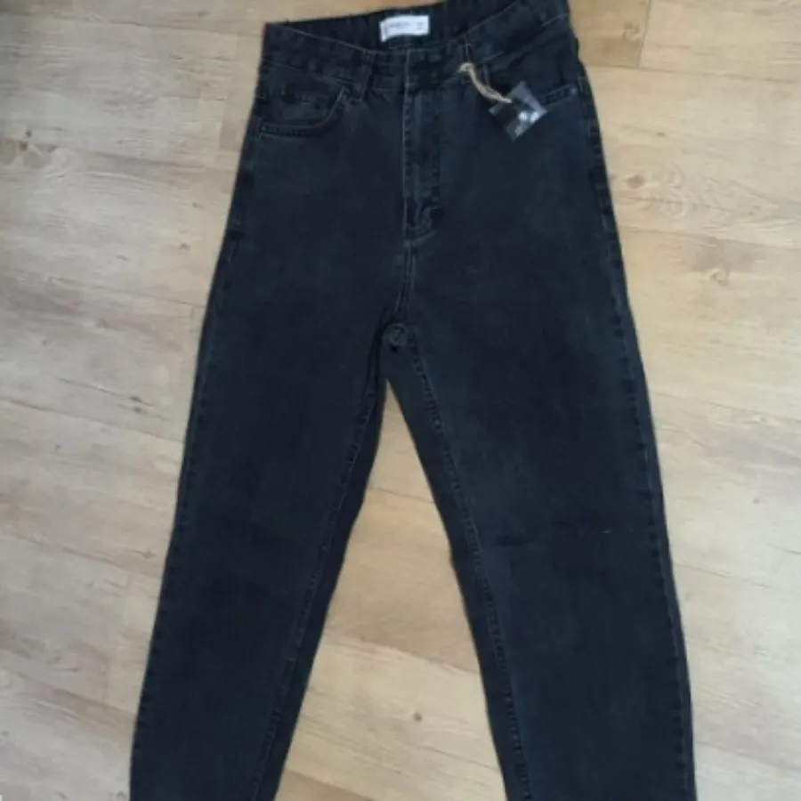 شلوار جین زغالی