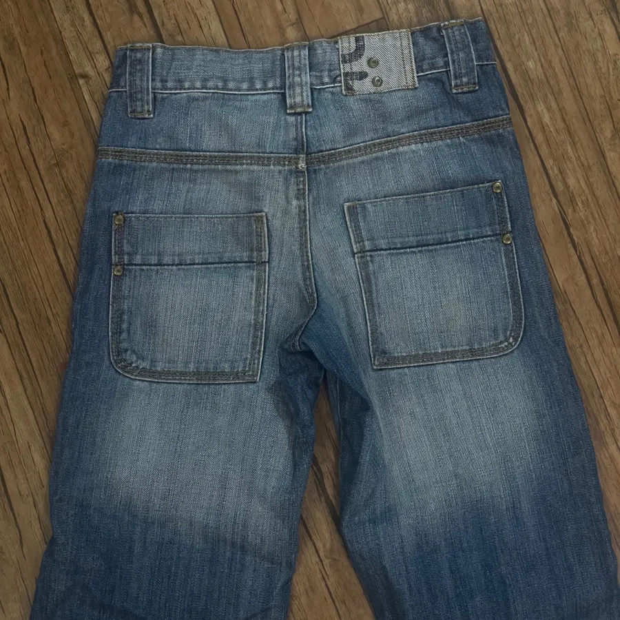 شلوار جین زاپ دار