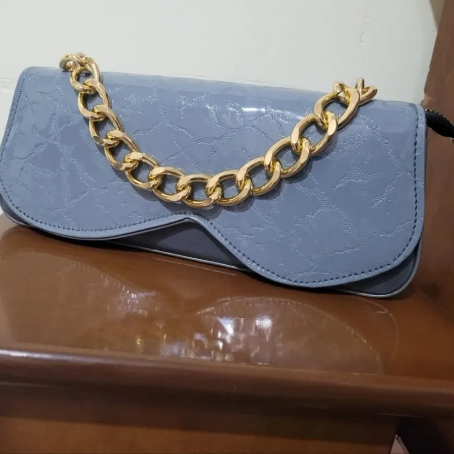 کیف مجلسی طوسی نقره ای