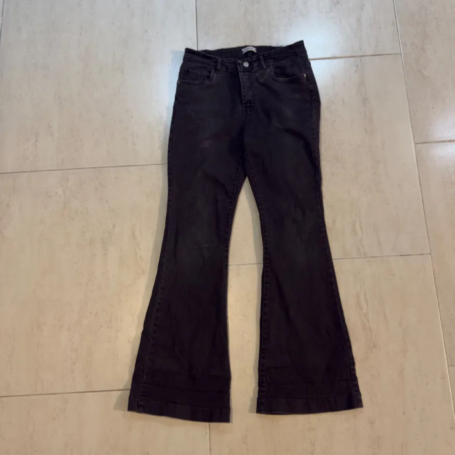 شلوار جین زغالی