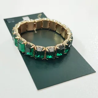 دستبند کشی طلایی نگین سبز