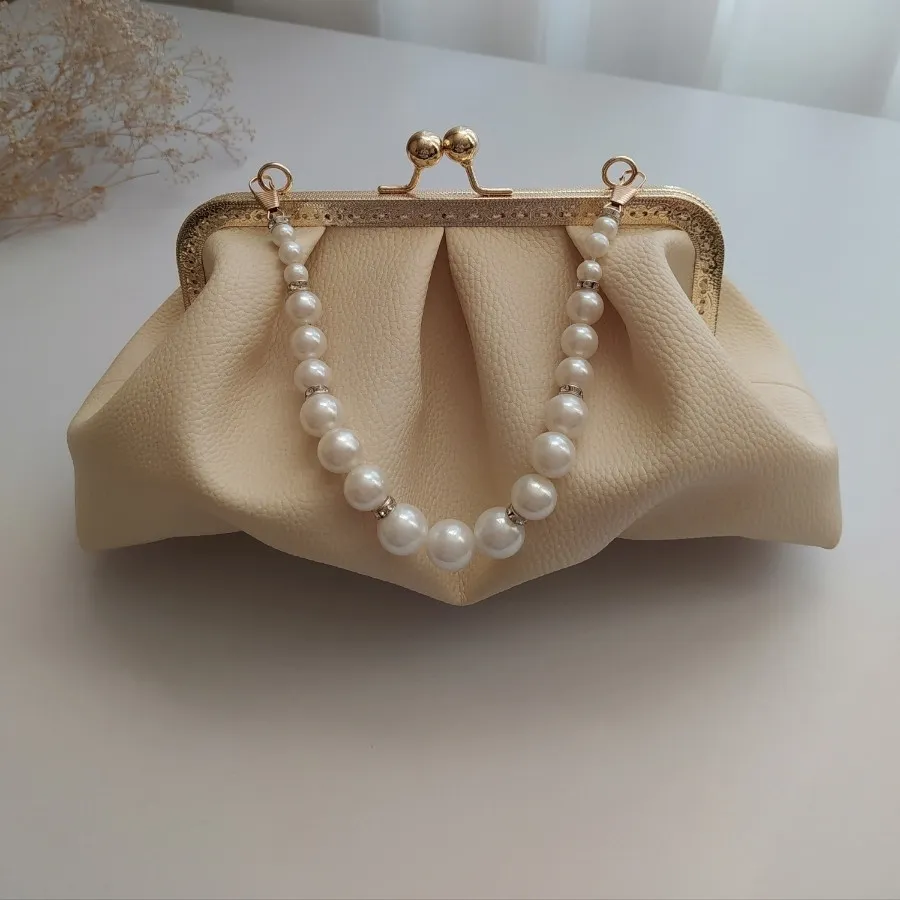 کیف زنانه دهانه فلزی