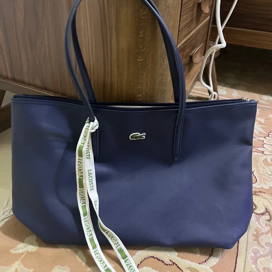 کیف سرمه ای برند لاگوست