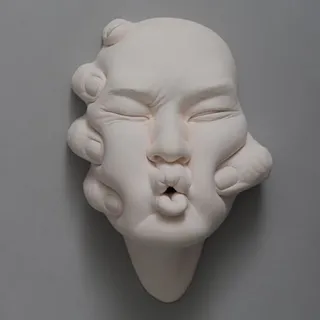 دیوارکوب صورتک