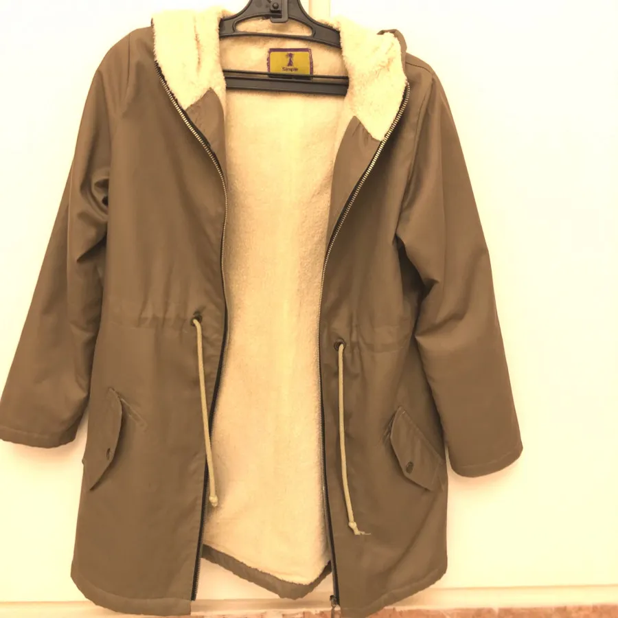 کاپشن داخل پشم