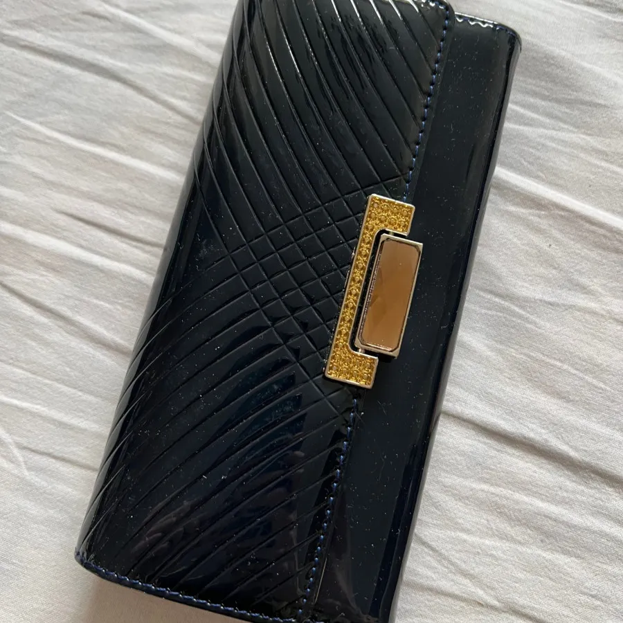 کیف پول ورنی سورمه ای