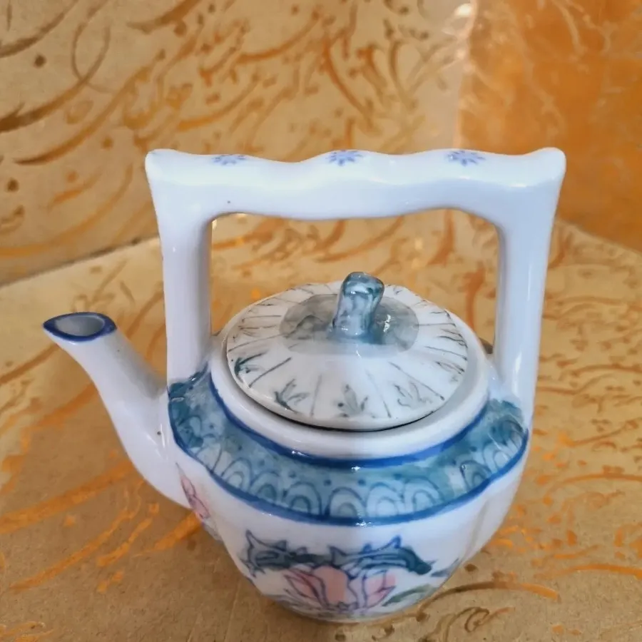 قوری زعفرانی