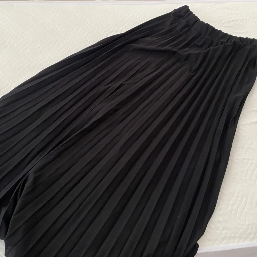 دامن پلیسه مشکی