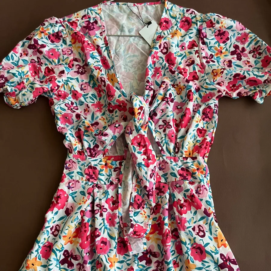 پیراهن گلدار جلوگره