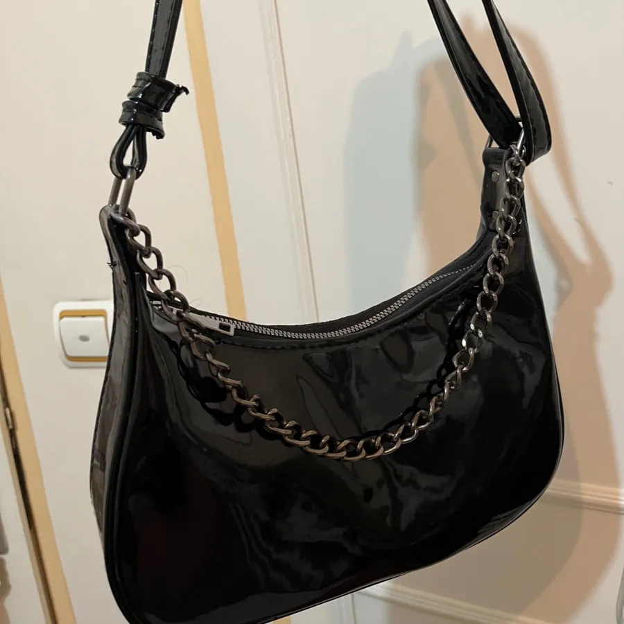 کیف مشکی ورنی مجلسی