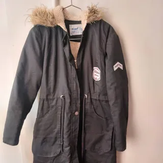 کاپشن بلند استرپشمی