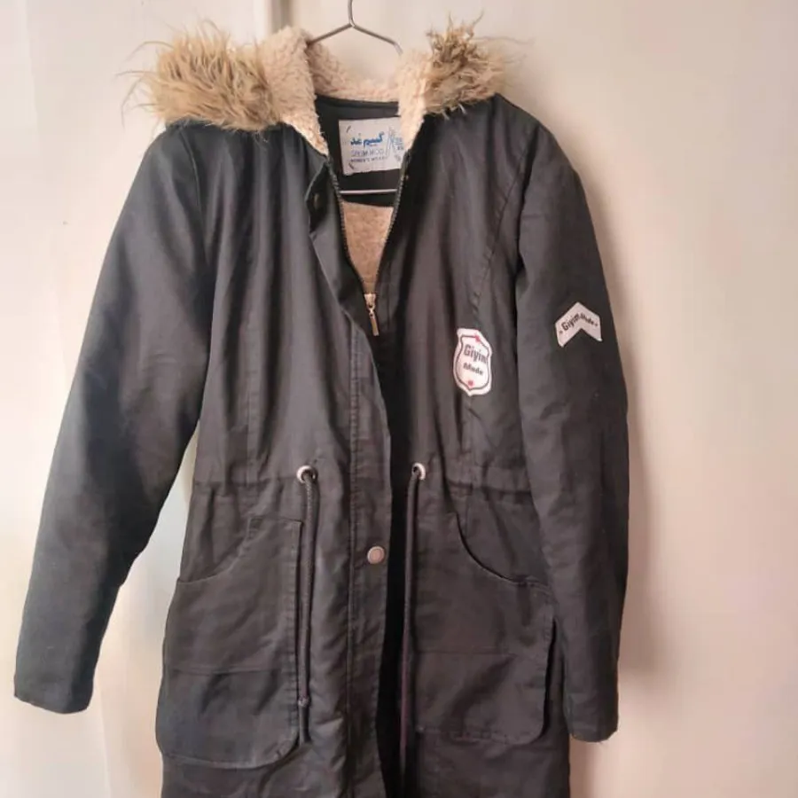 کاپشن بلند استرپشمی