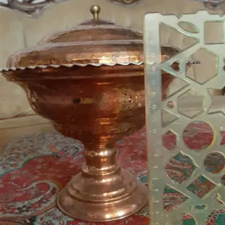 ظرف مسی.