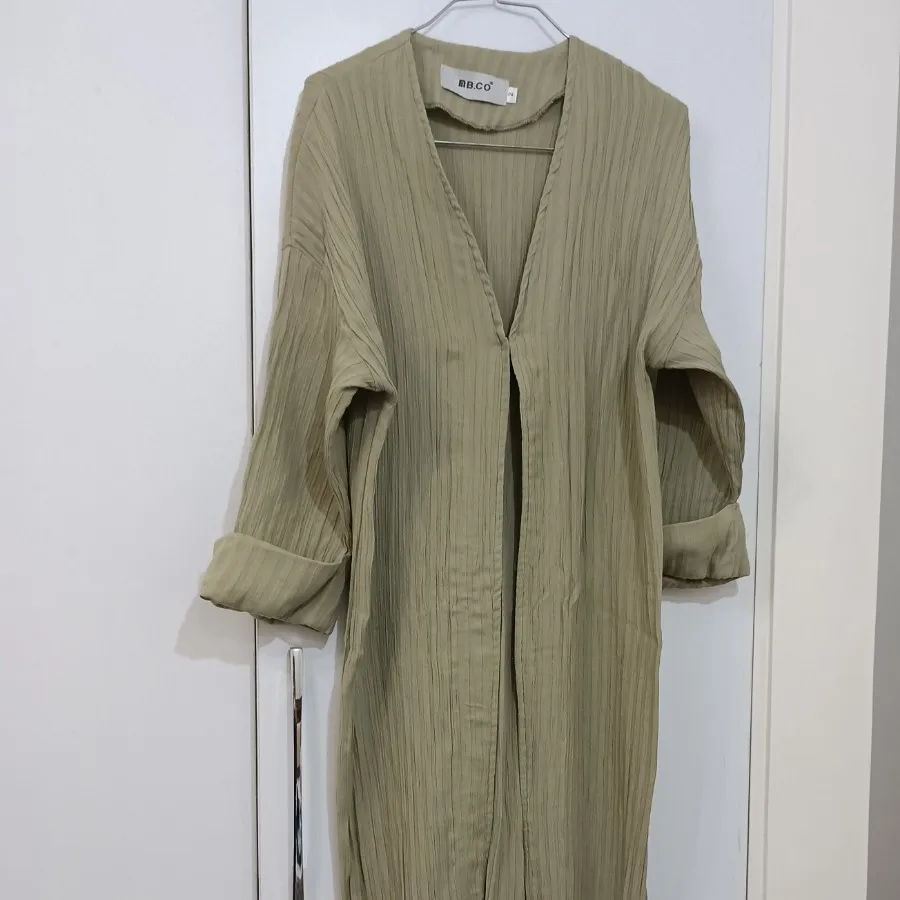 مانتوی پلیسه نخی