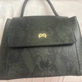 کیف چرم سبز و مشکی منط