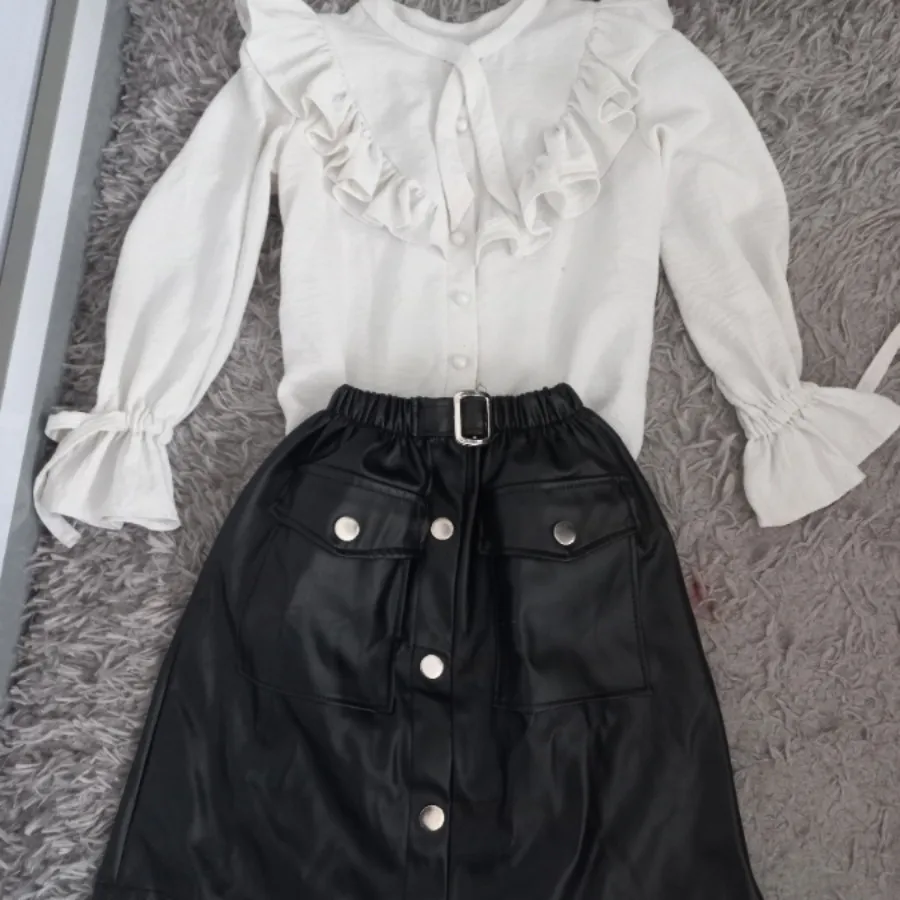 شومیز و دامن چرم