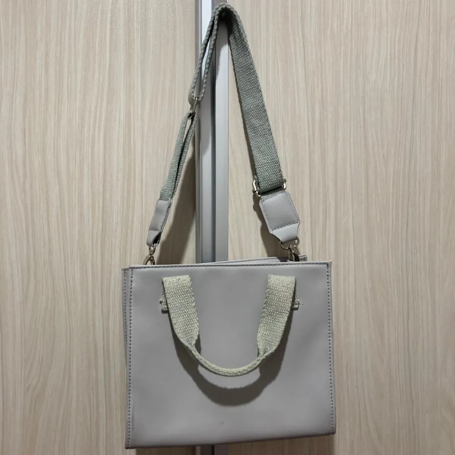 کیف دوشی دستی