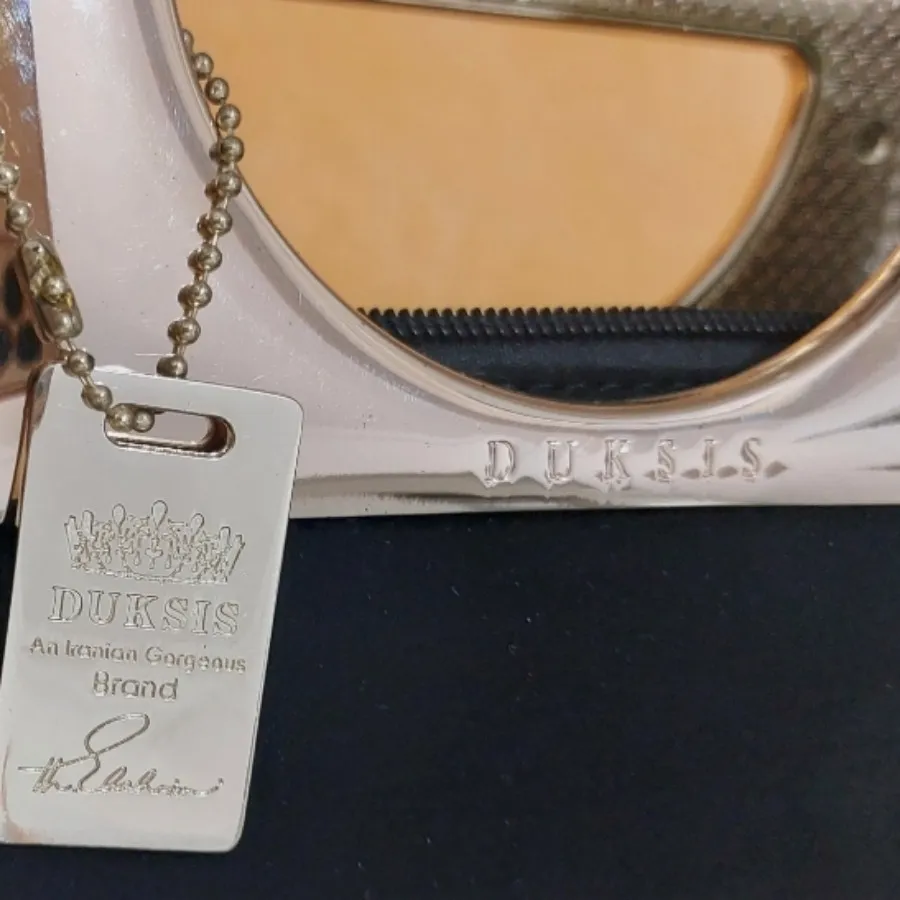 کیف برند دوکسیس