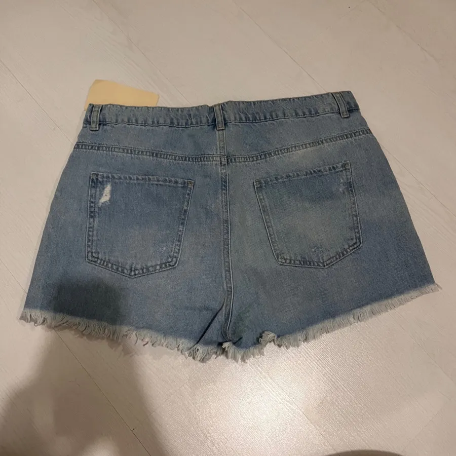 شلوارک جین السی وایکیکی