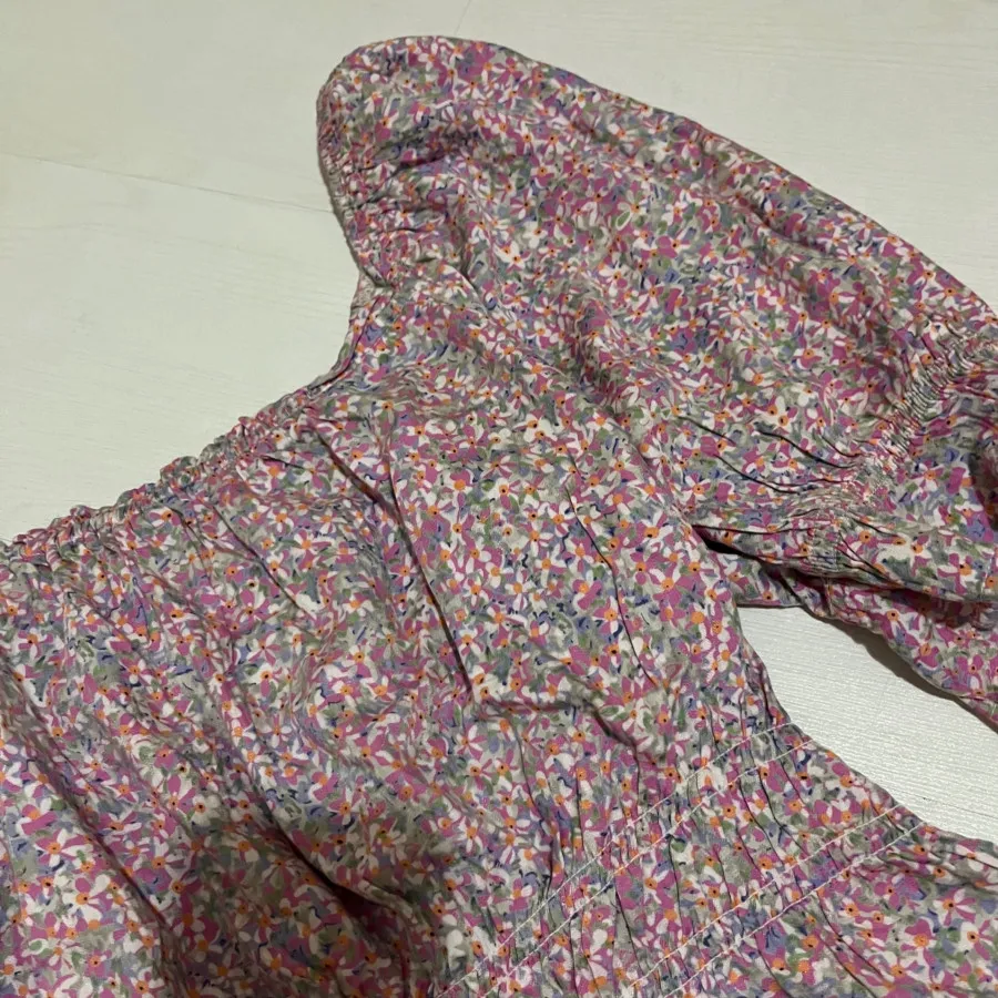 تاپ گلدار یقه قایقی