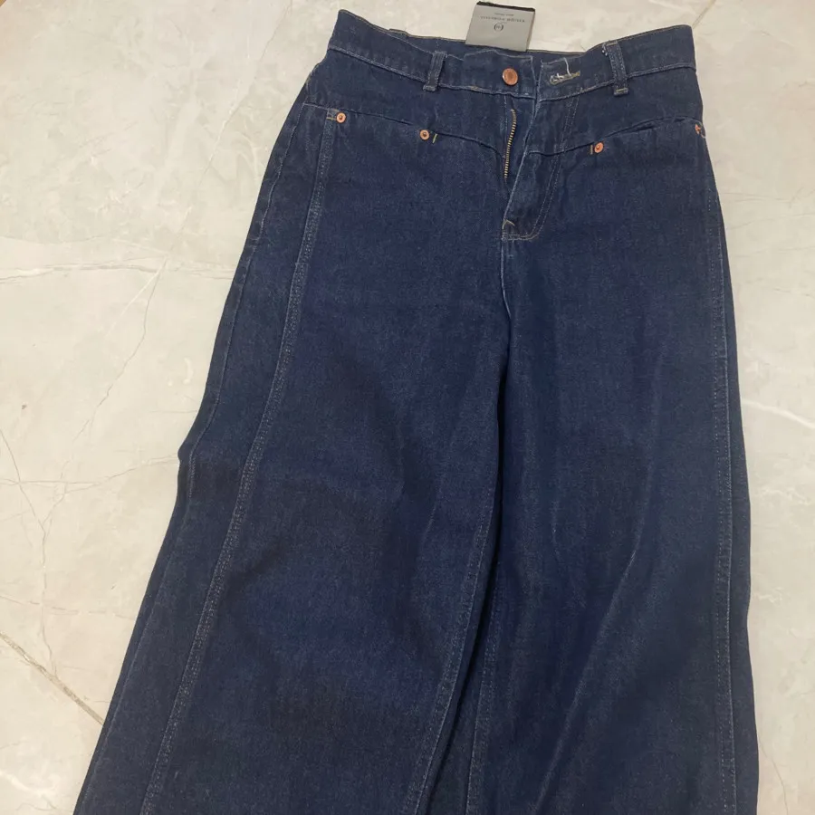 شلوار جین مک کویین برند