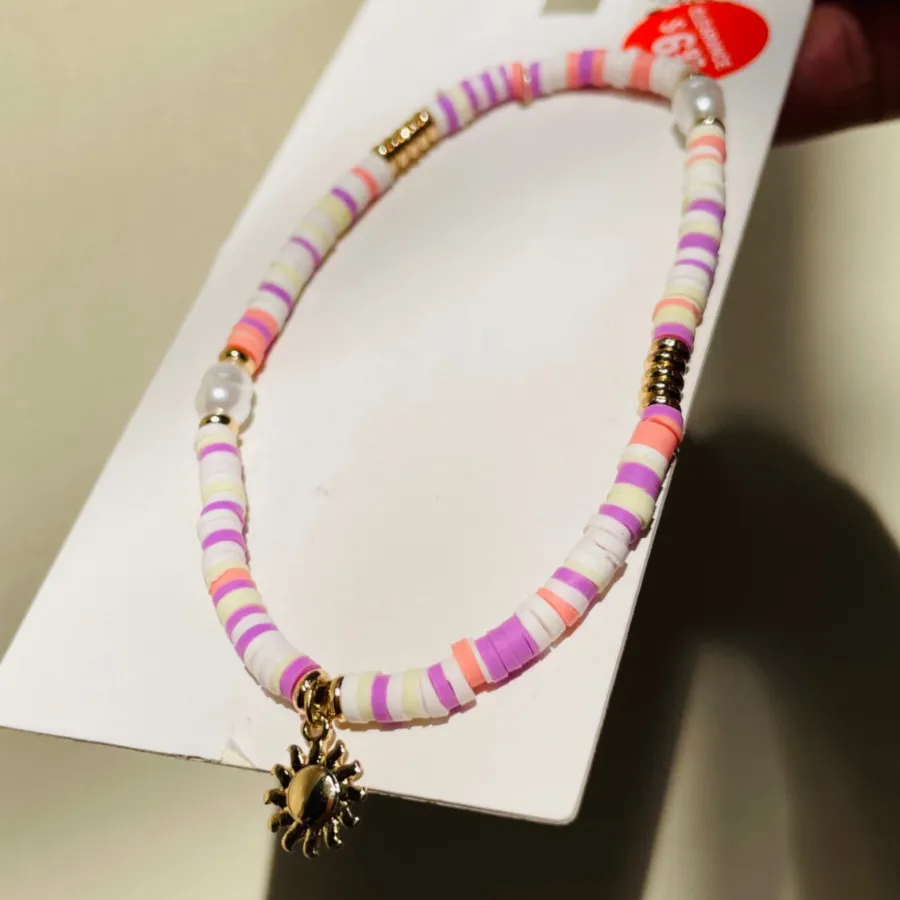 پابند مهره ای خوشید نشان