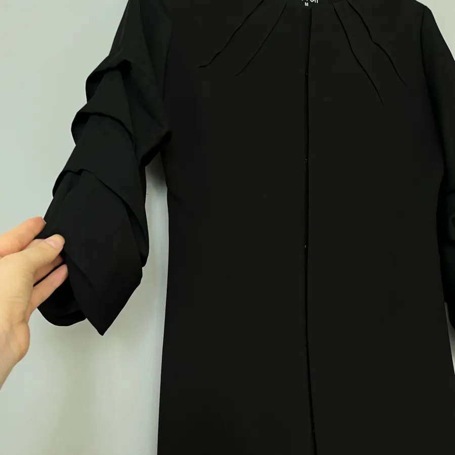 مانتومشکیkoton