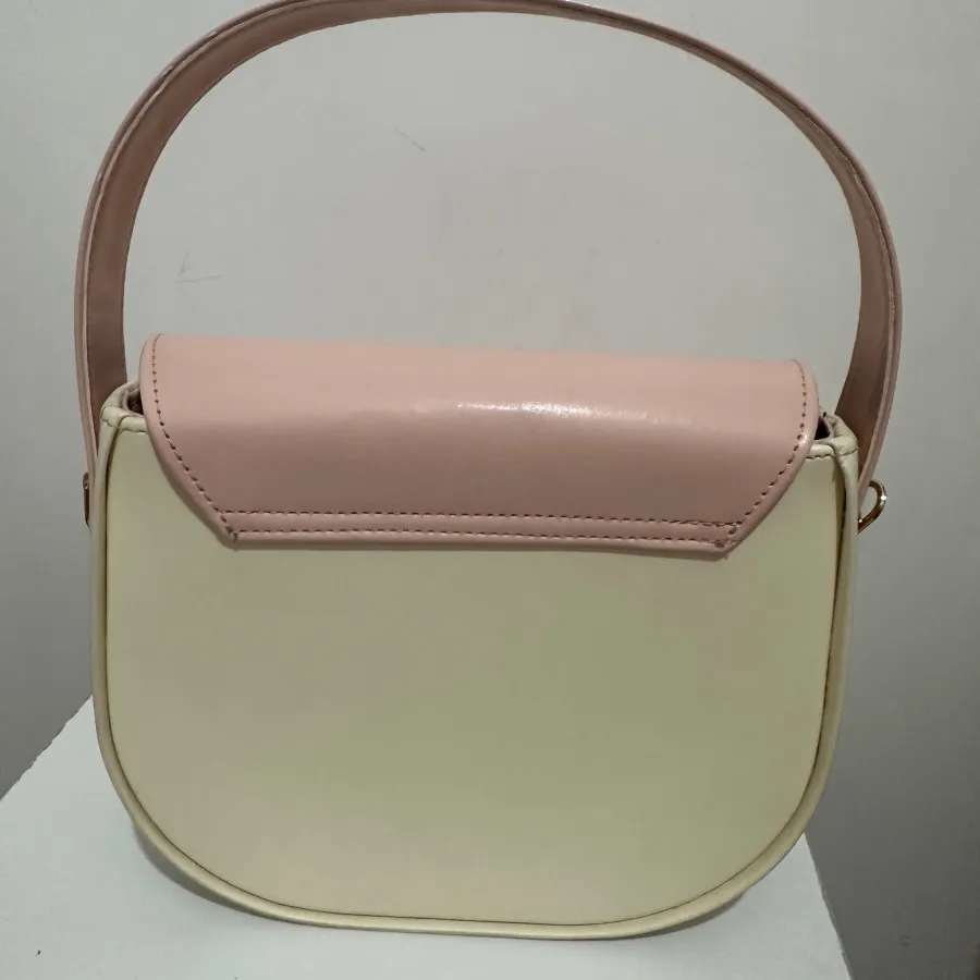 کیف کرم صورتی