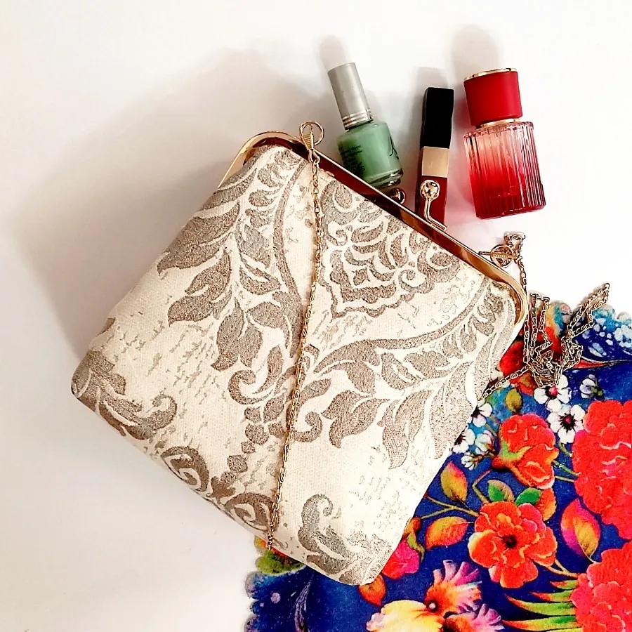 کیف دهانه فلزی