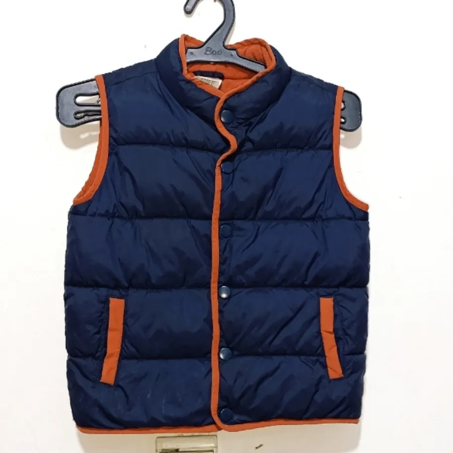 کاپشن جلیقه بچگانه