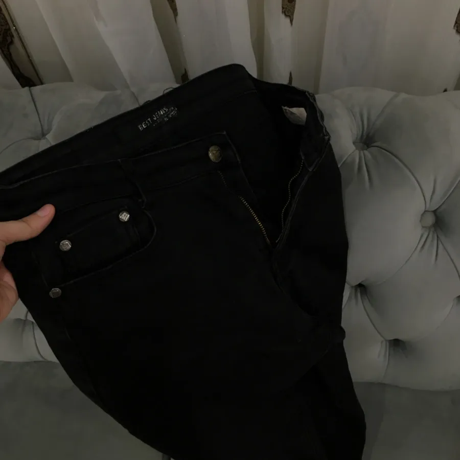 شلوارجین مشکی نیم بگ راست