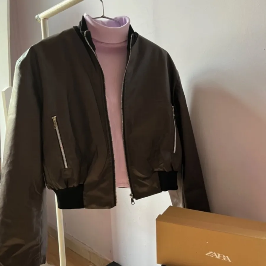 کت چرم قهوه ای