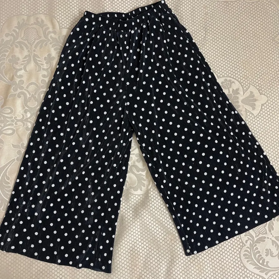 شلوار پلیسه جنس صدفی