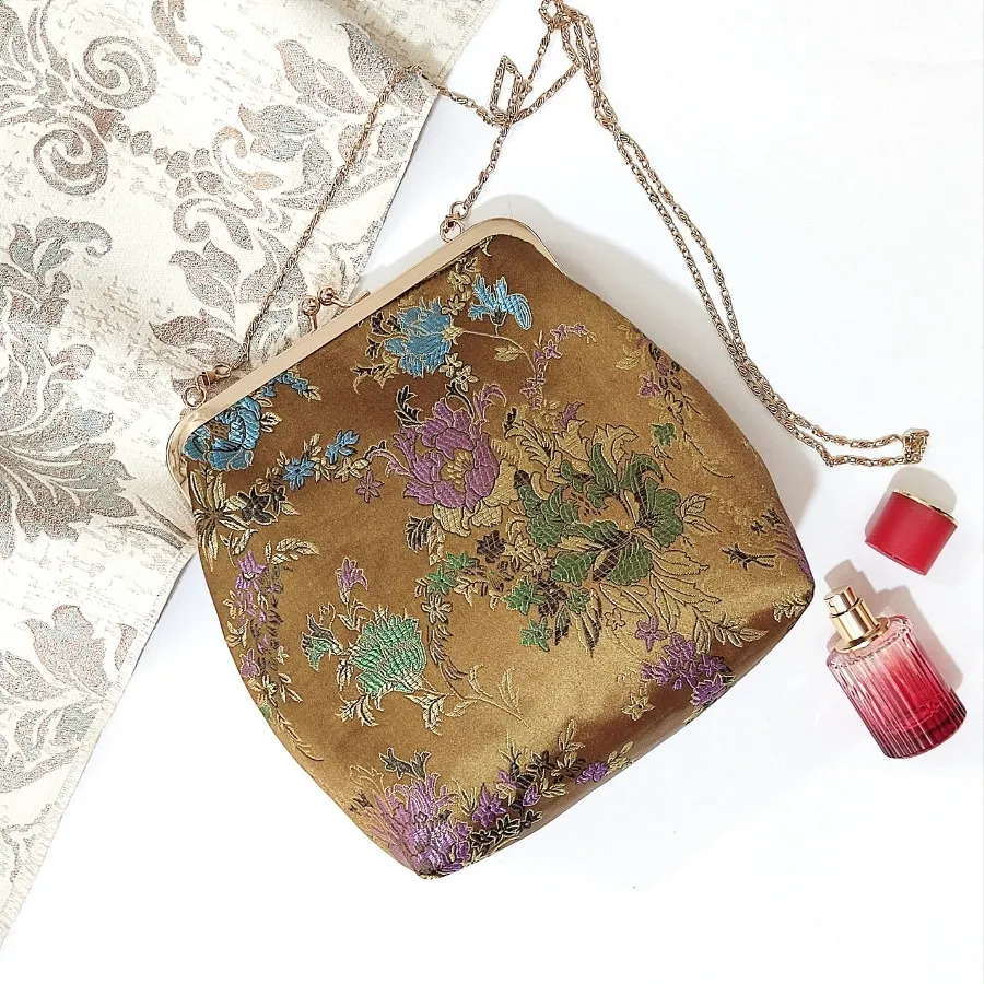 کیف دهانه فلزی