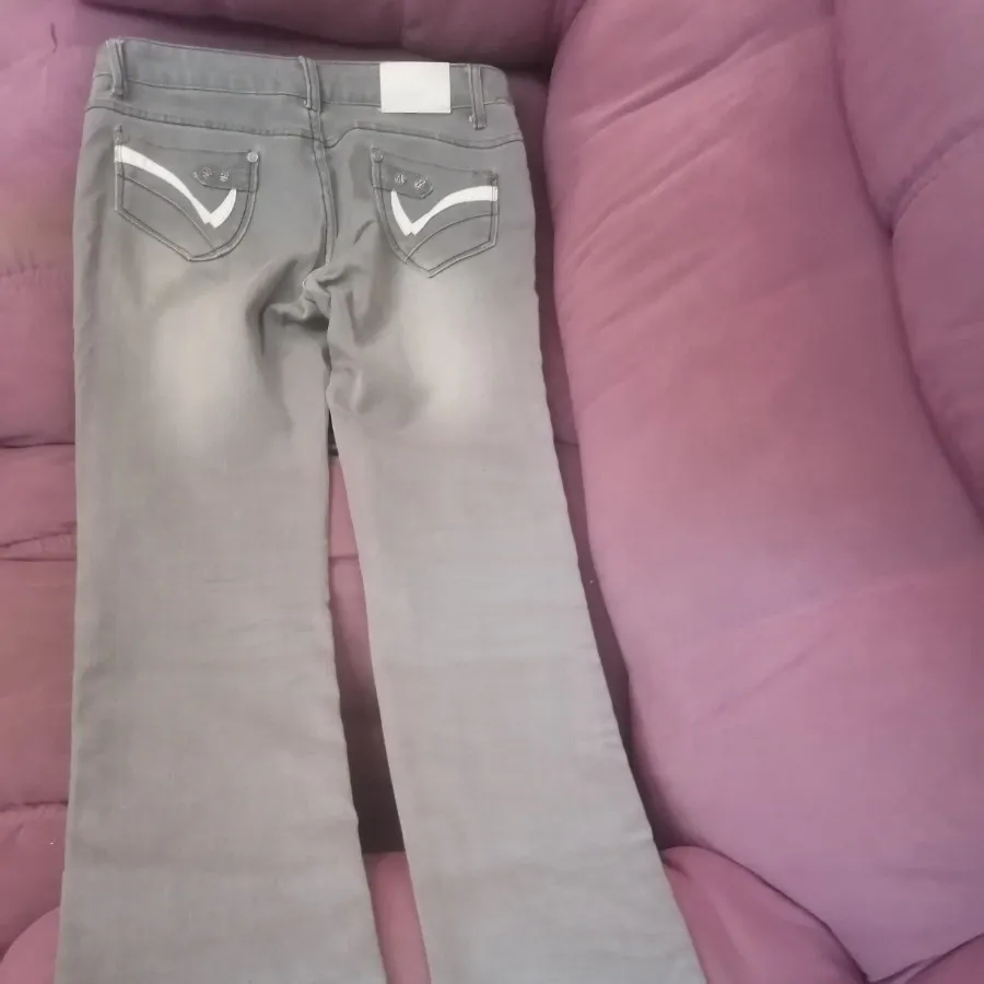 شلوار جین خاکستری